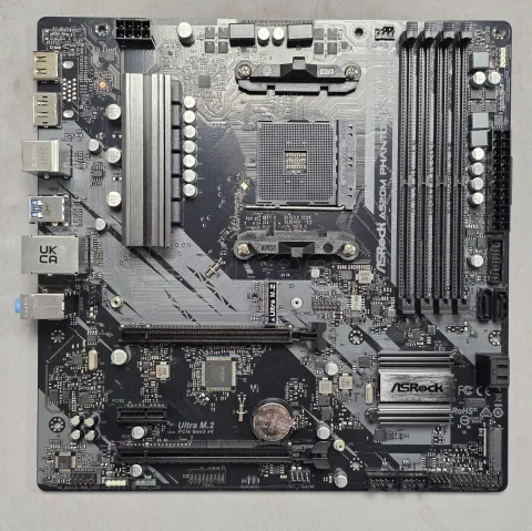 Photo de Carte Mère ASRock A520M Phantom Gaming 4 (AM4) Micro-ATX - S/N QH3M0XB137534 - ID 222615