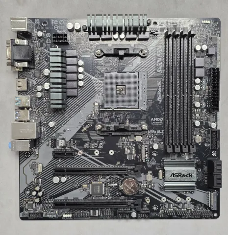 Photo de Carte Mère ASRock B450M Pro4 R2.0 (AM4) Micro ATX - S/N HBM0XB161187 - ID 222635