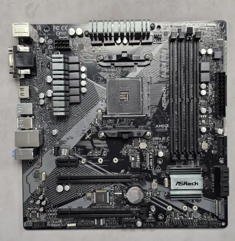 Photo de Carte Mère ASRock B450M Pro4 R2.0 (AM4) Micro ATX - S/N J4M0XB220518 - ID 222633