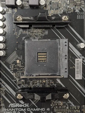 Photo de Carte Mère ASRock X570 Phantom Gaming 4 (AM4) - S/N GAM0XB035332 - ID 222644