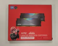 Photo de Kit Barrettes mémoire 32Go (2x16Go) DIMM DDR5 Adata XPG Lancer Rog Certified RGB 6600MHz (Argent) - SN 1O0100545387/35 - ID 203959